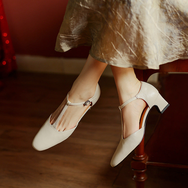 Women's leather T-strap heels, front view