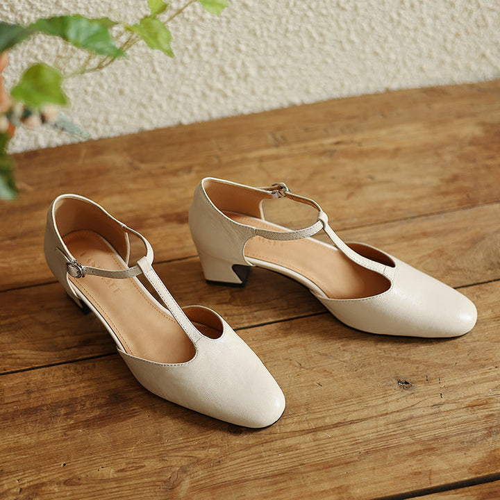 Cushioned insole of a leather T-strap heel