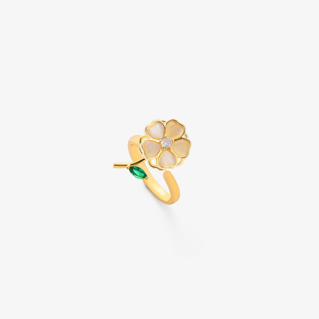 Maeve™ - Anello a Spirale con Fiore di Foglia e Smeraldo in Oro