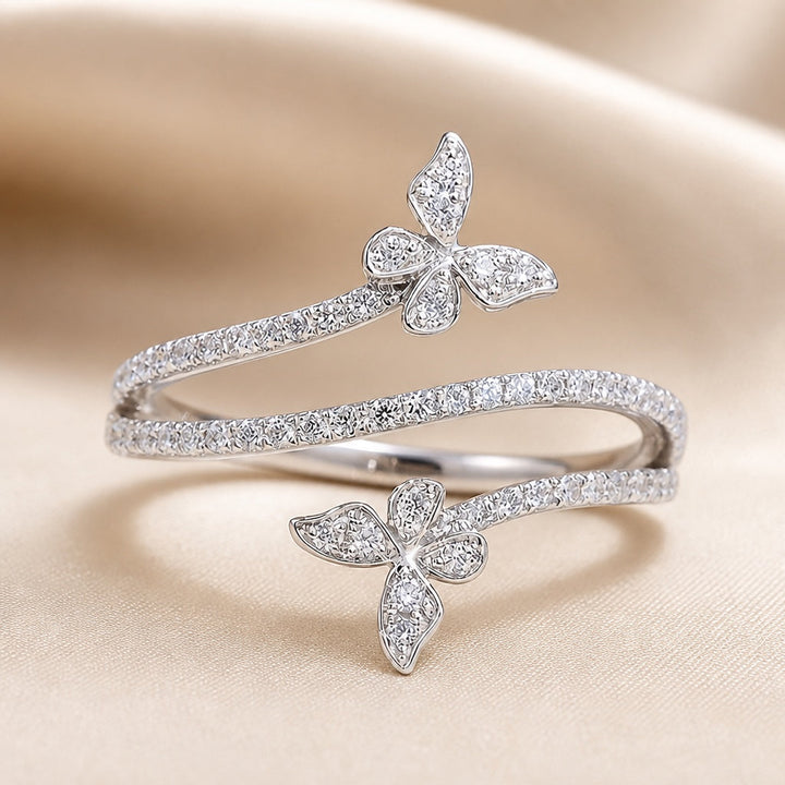 Butterfly-Embellished White Gold Ring with Zirconia Inlays