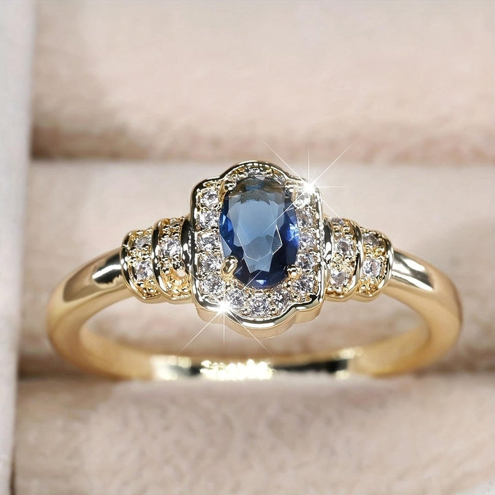 Azzurra™ - Sapphire Halo Ring with Stunning Crystal