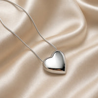 Classic White Gold Necklace Featuring a Puffy Heart Pendant