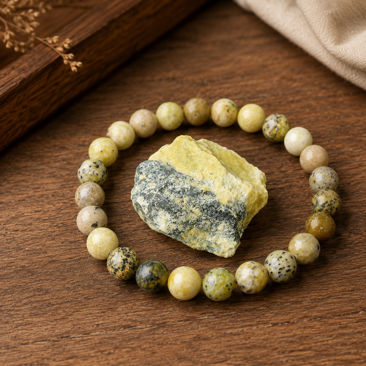 Close-up of natural yellow jasper gemstone healing beads