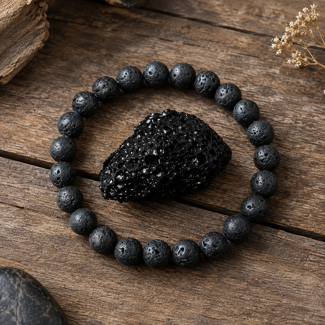 Close-up of natural black lava stone healing beads