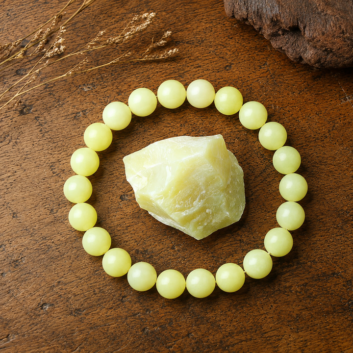 Close-up of natural green jade gemstone healing beads