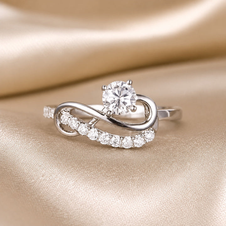 White Gold Moissanite Ring with Infinity Swirl Wave Design